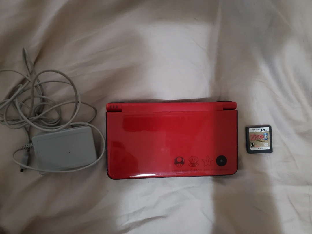Red Nintendo DSi XL Mario 25th Anniversary Edition