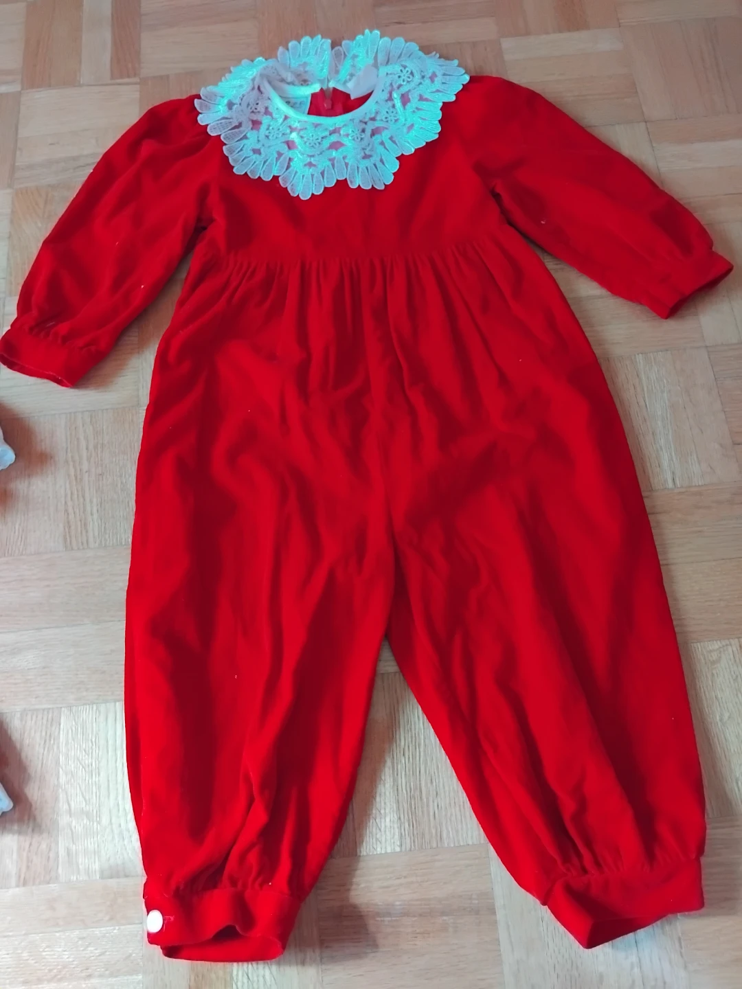 Red velour toddler jumpsuit with lace collar