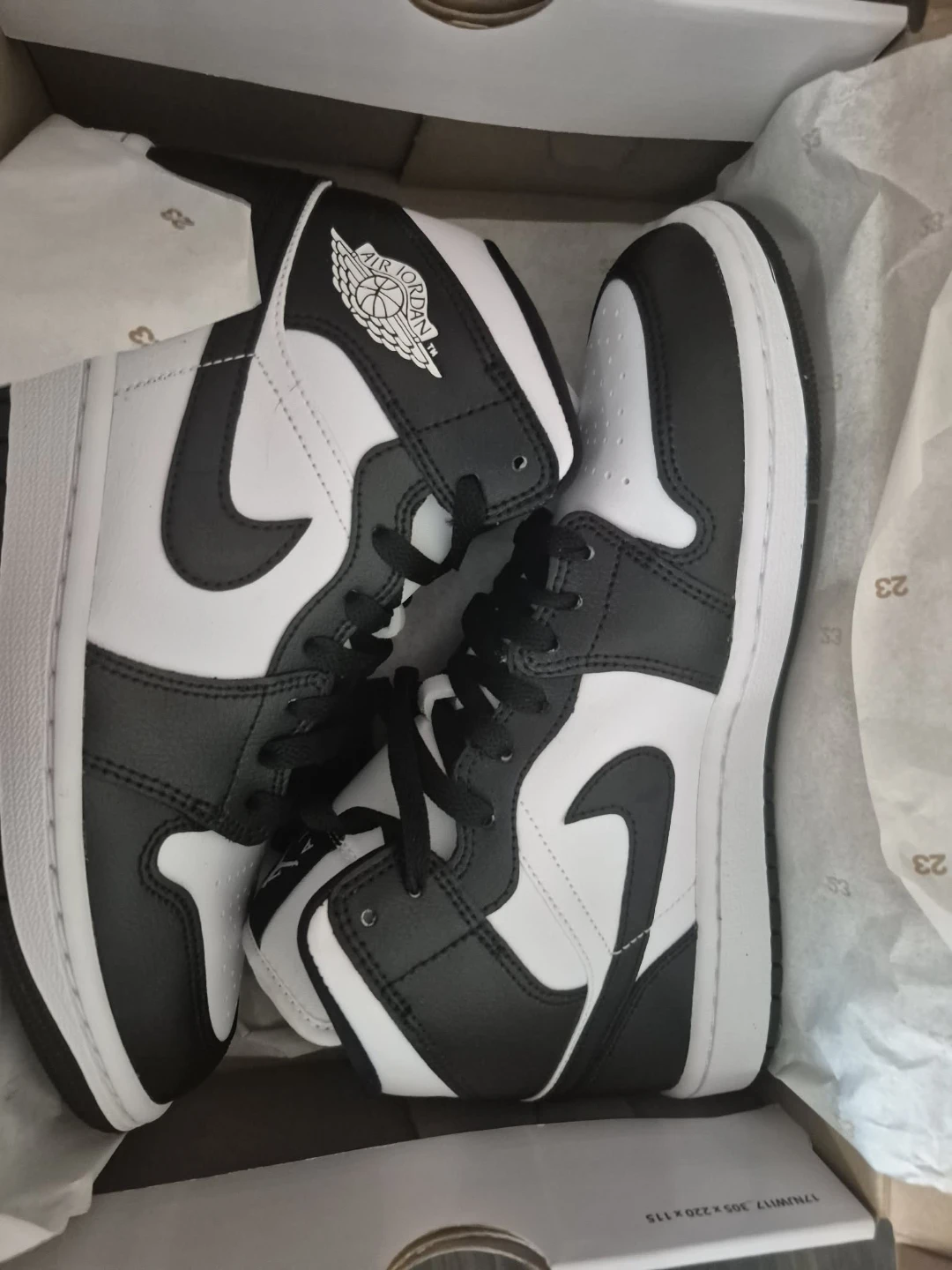 Air Jordan 1 Mid Black White Sneakers