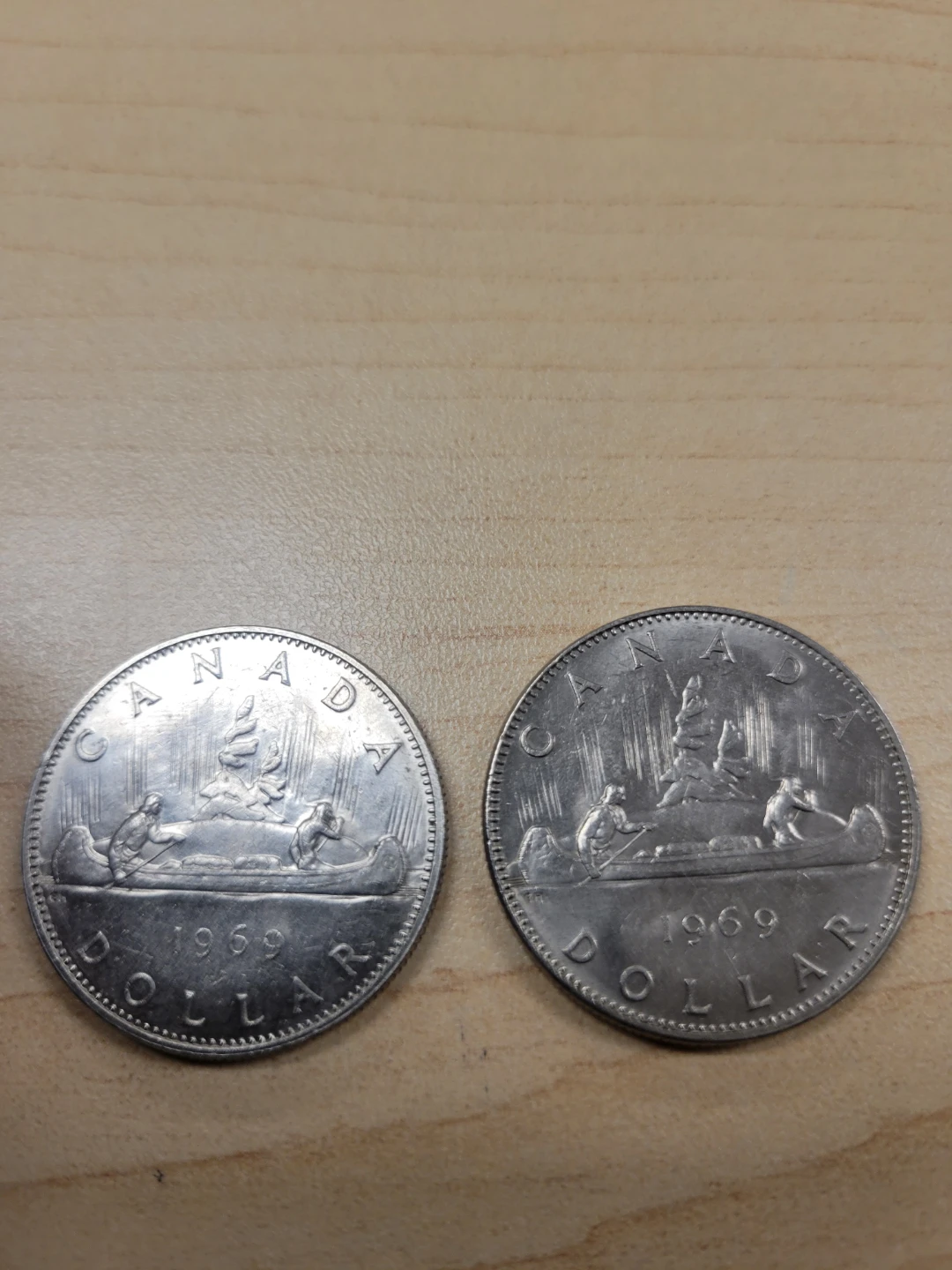 Two 1969 Canadian Dollar Coins