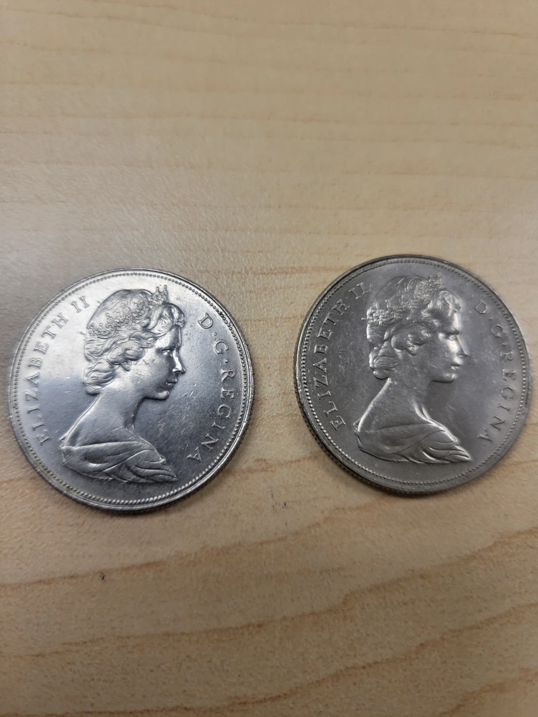 Two 1969 Canadian Dollar Coins - photo 2