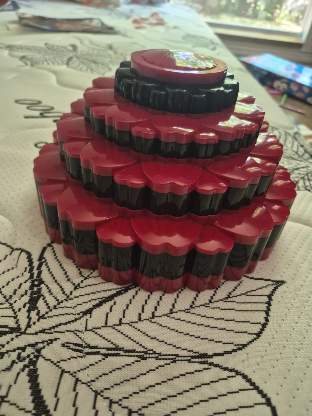 Red and Black Tiered make up kit.
