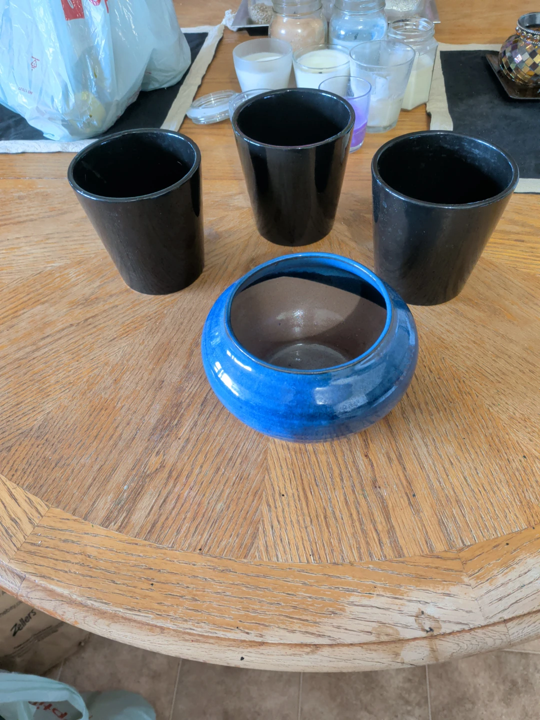 Set of 3 Black Planters and 1 Blue Ceramic Pot