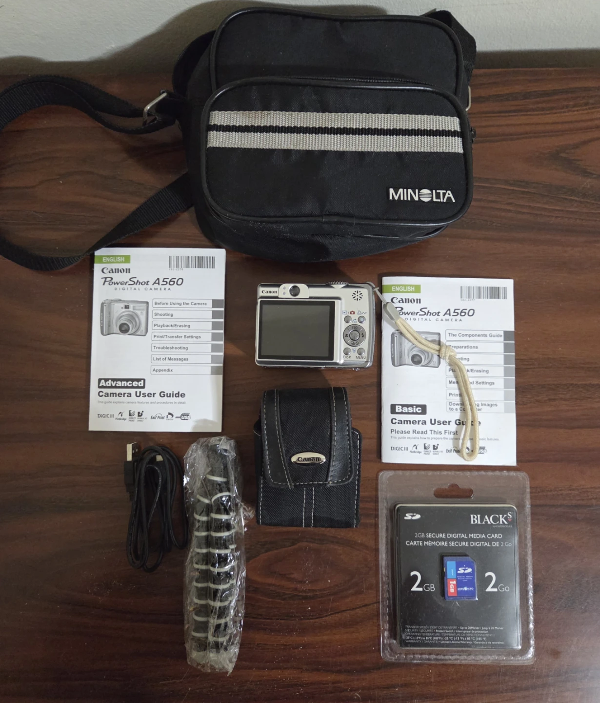 Canon PowerShot A560 Digital Camera Bundle with Bag and SD Card - photo 2