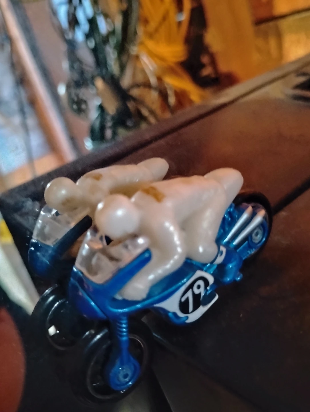 Blue and White Motorcycle Toy with Rider
