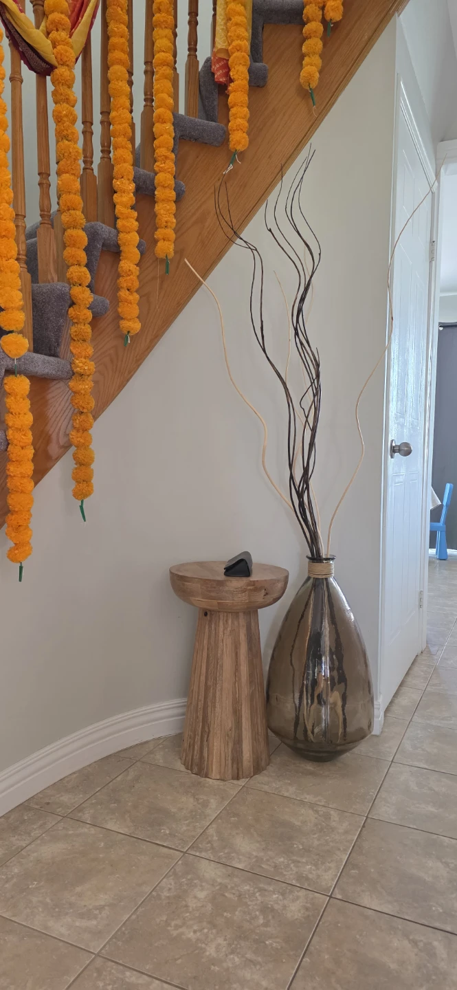 Vase with decorative sticks