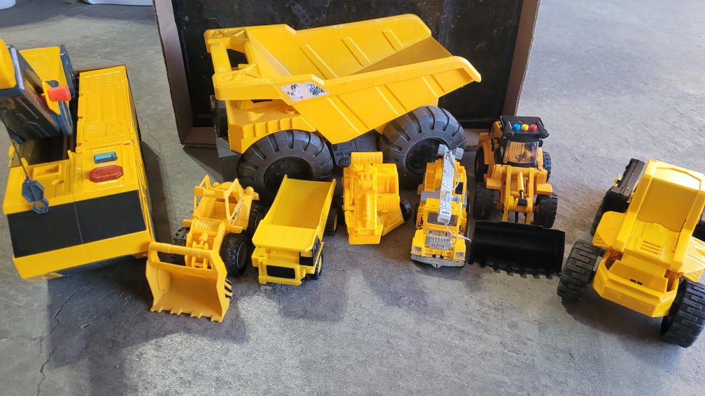 Bundle of Yellow Toy Construction Vehicles
