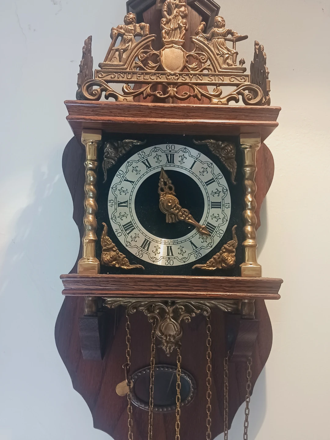 Antique Wooden Cuckoo Clock with Ornate Metal Details