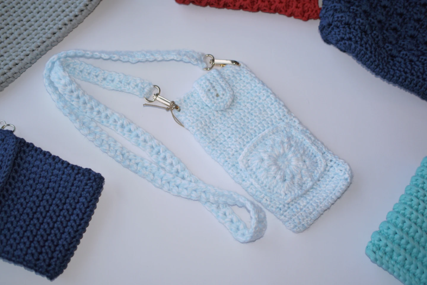 Crocheted phone pouch with strap