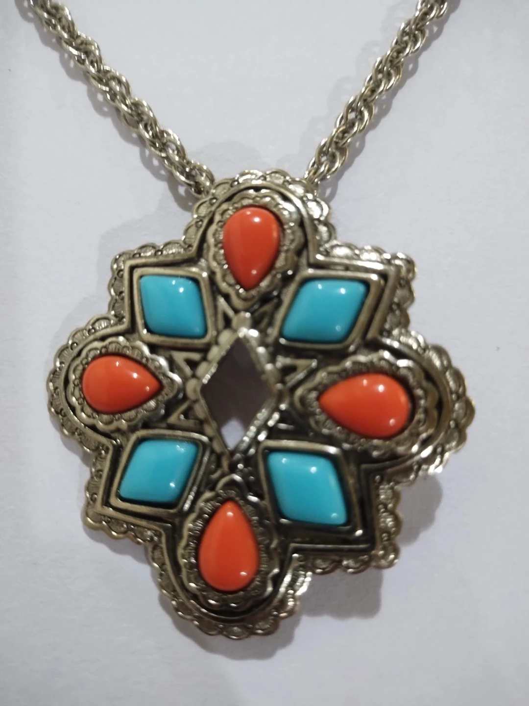 Vintage Avon American spirit pin/pendant and dangling earrings