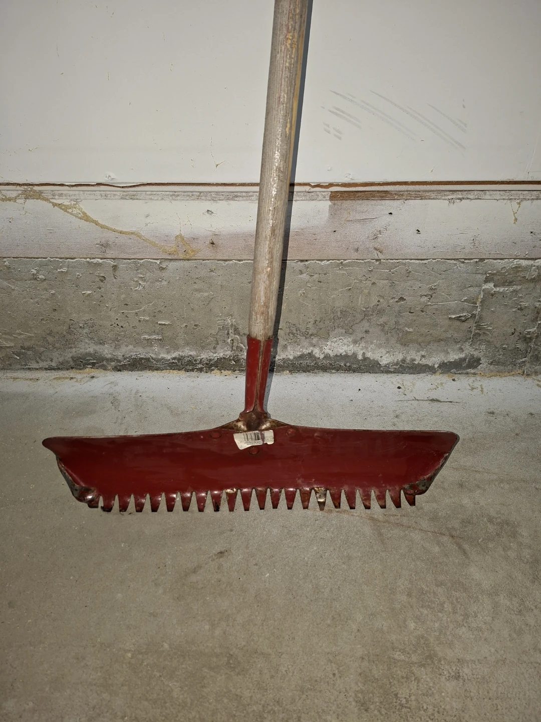 Red Metal Rake with Wooden Handle