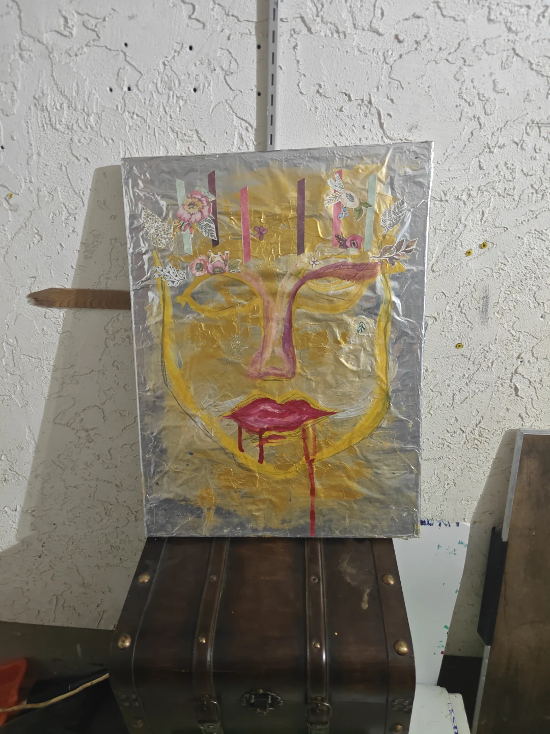 Abstract Face Painting with Floral Accents