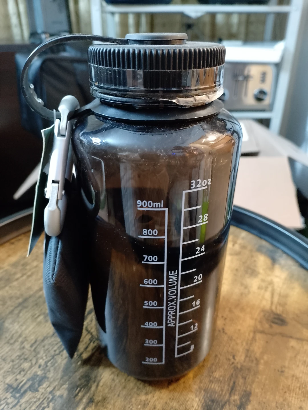 Roots Water Bottle with Carabiner Clip and First Aid Kit