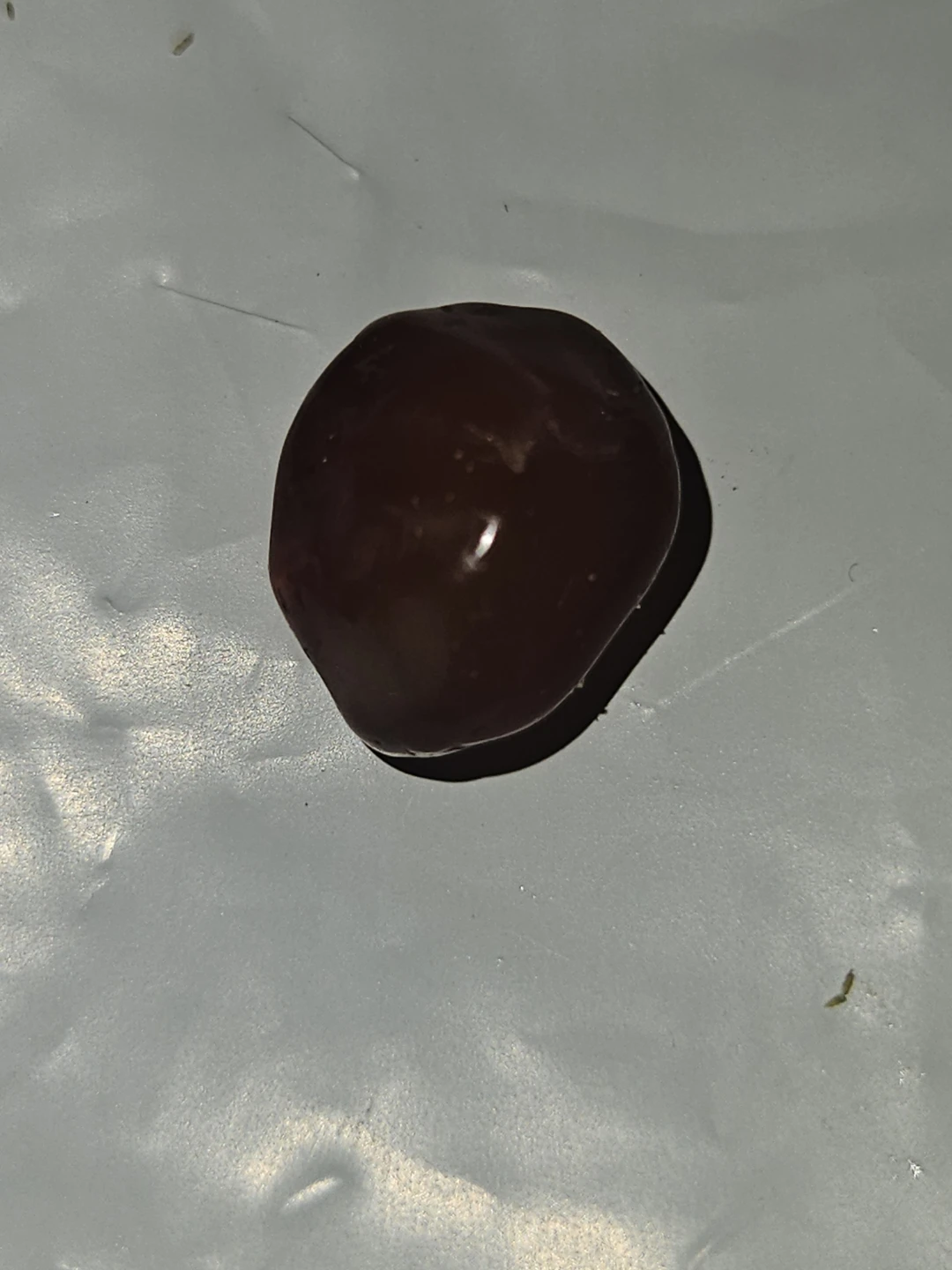 Gemstone lot - amber, dark gemstone, and diamond tester reading - photo 4