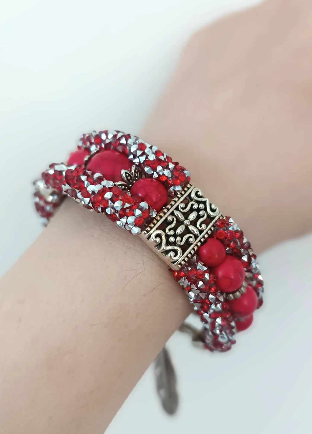 Red Beaded Bracelet with Feather Charm