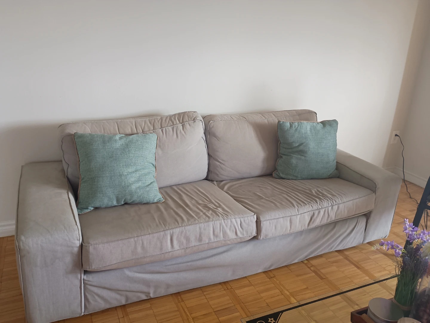 Grey Sofa with Teal Accent Pillows