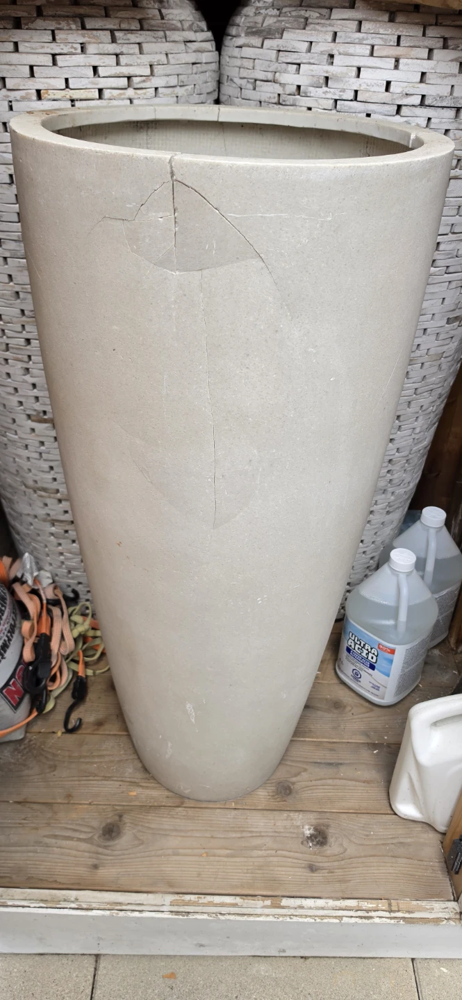 Two Large Cracked Resin Planters