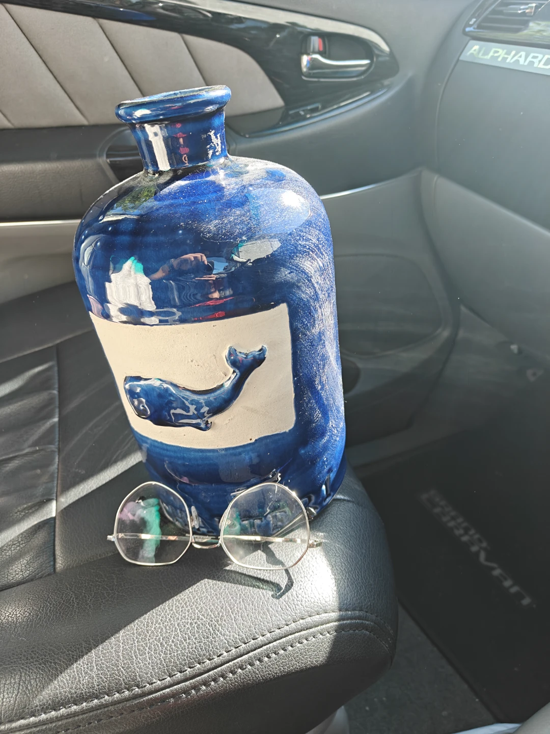 Ceramic vase with whale design