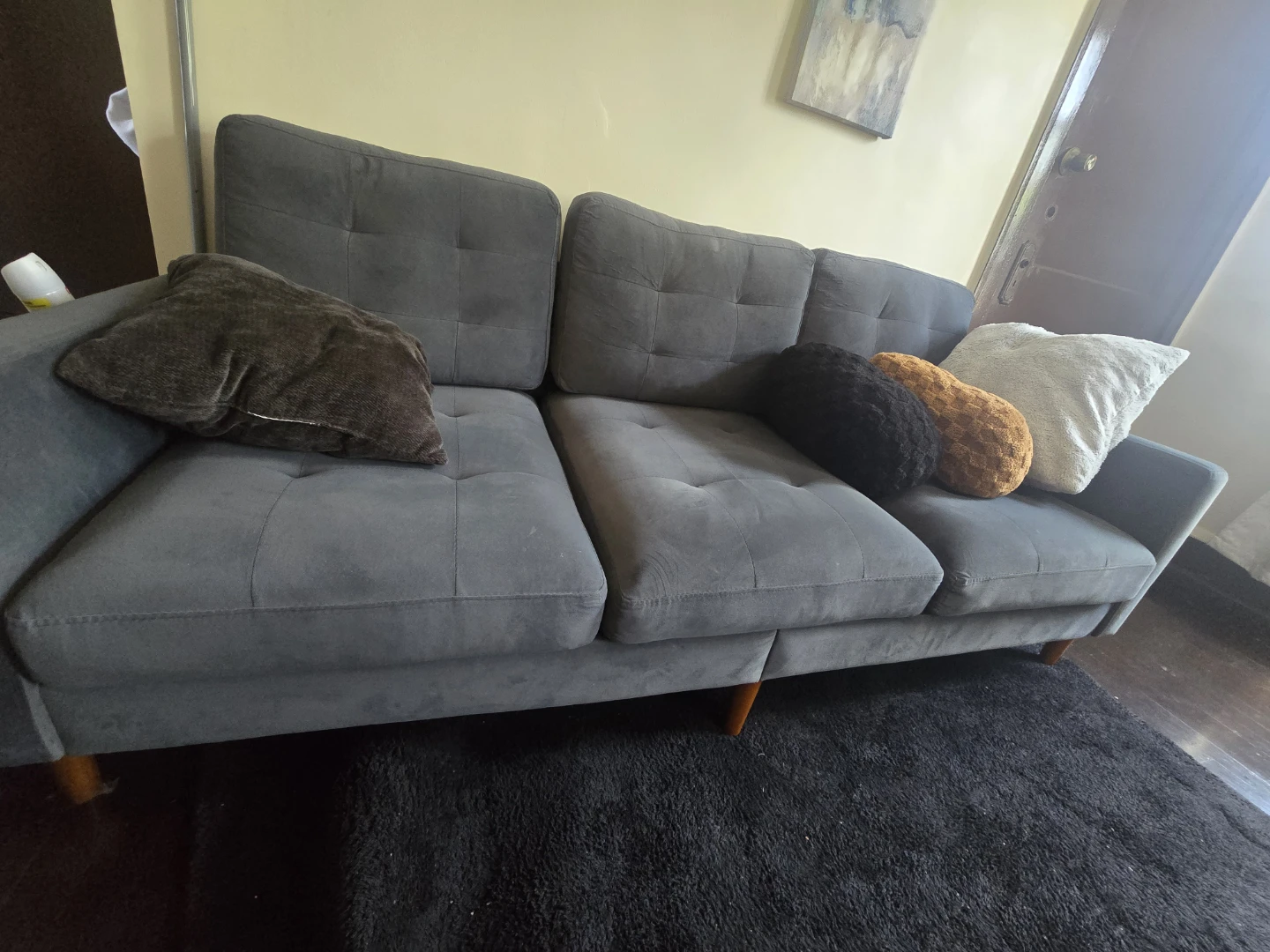 Gray Sectional Sofa with Pillows and decorative coffee table