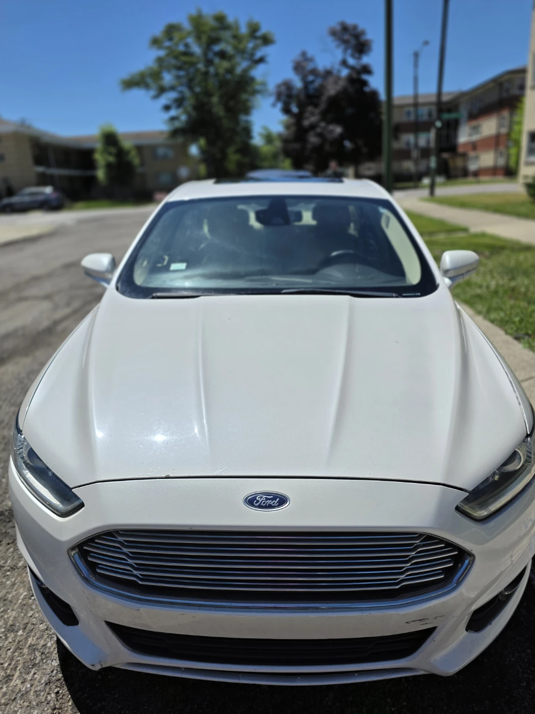 White Ford Fusion Sedan