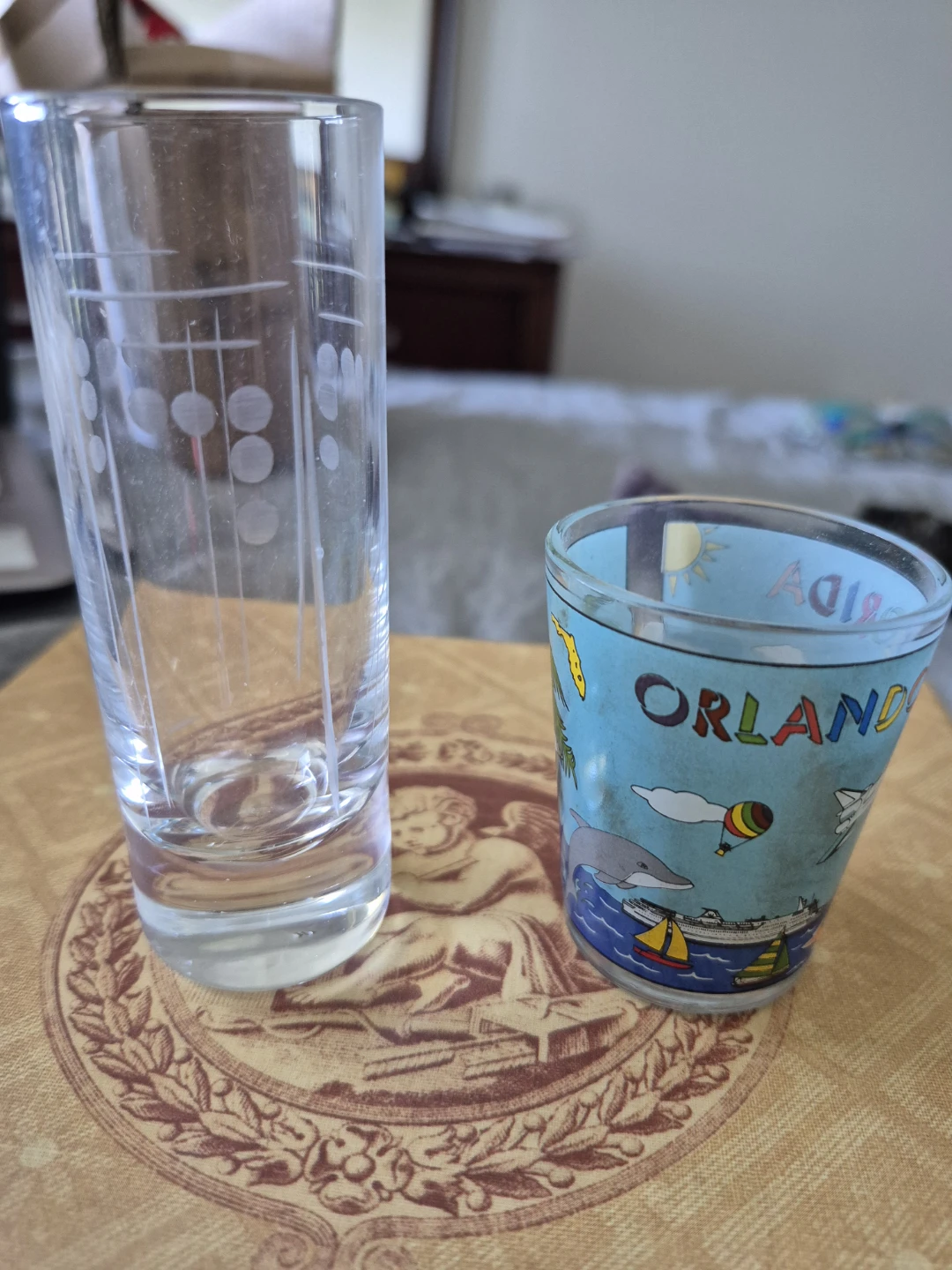 10 different sized  shot glasses (size differences in image)