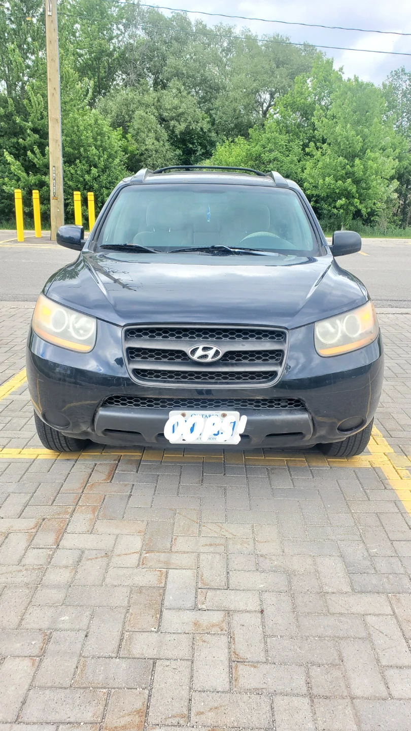 Dark Blue Hyundai Santa Fe SUV