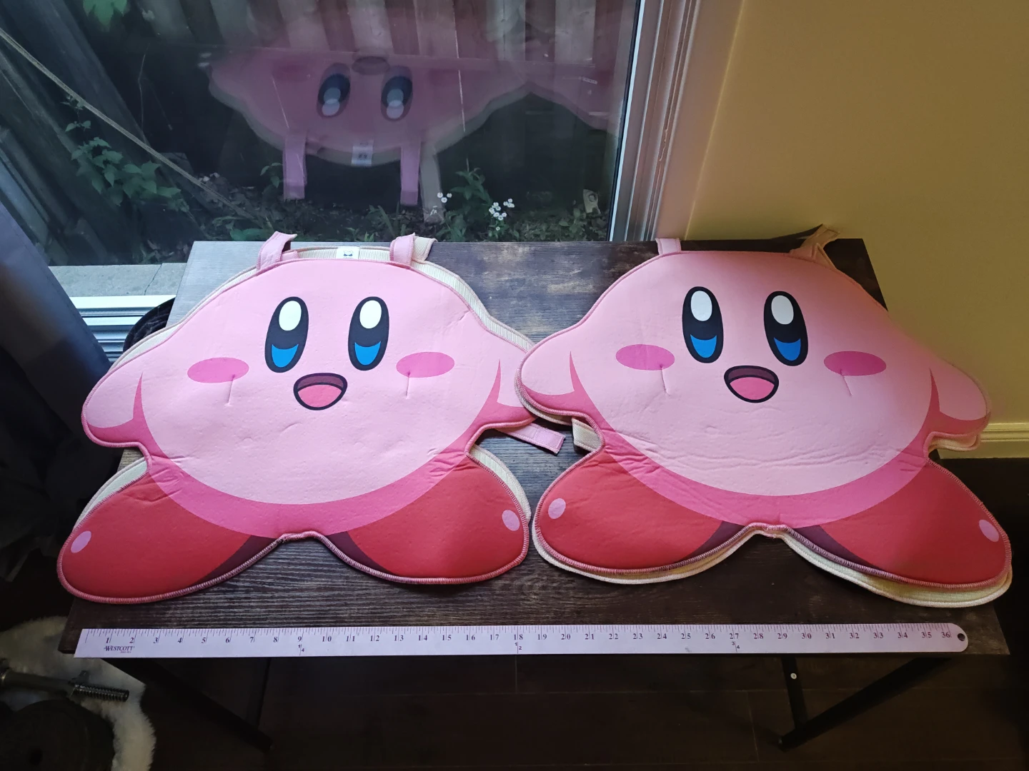 Set of 3 cutout costumes, 2x Kirby's and 1x poop emoji