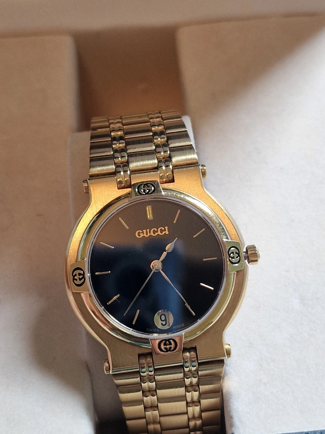 Gold Tone Gucci Watch with Black Dial