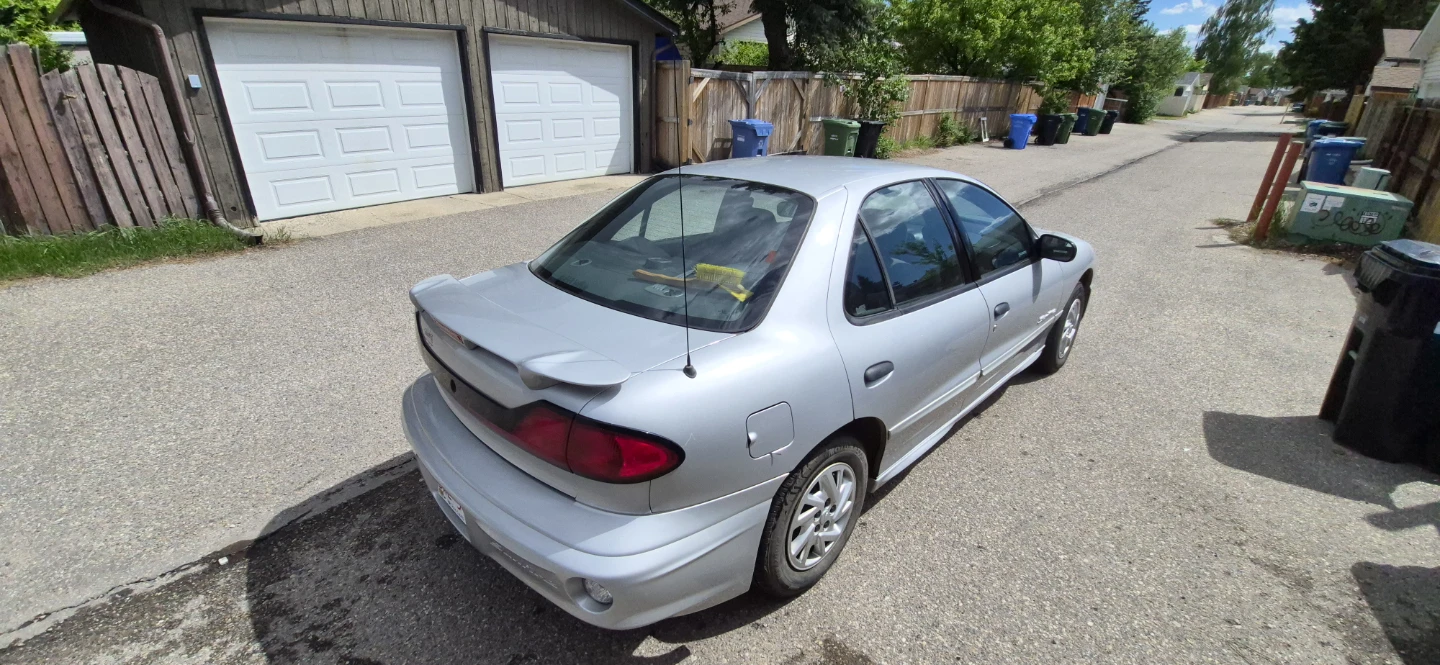 Silver Pontiac Sunfire Sedan - photo 2