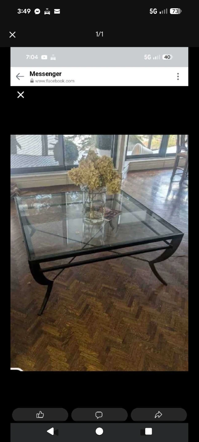 Glass top coffee table with metal frame