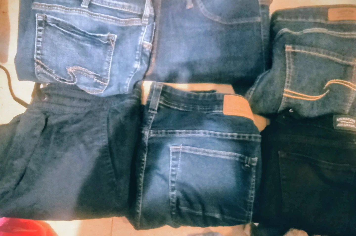 6 pairs or s of brand name jeans either worn once or not at all