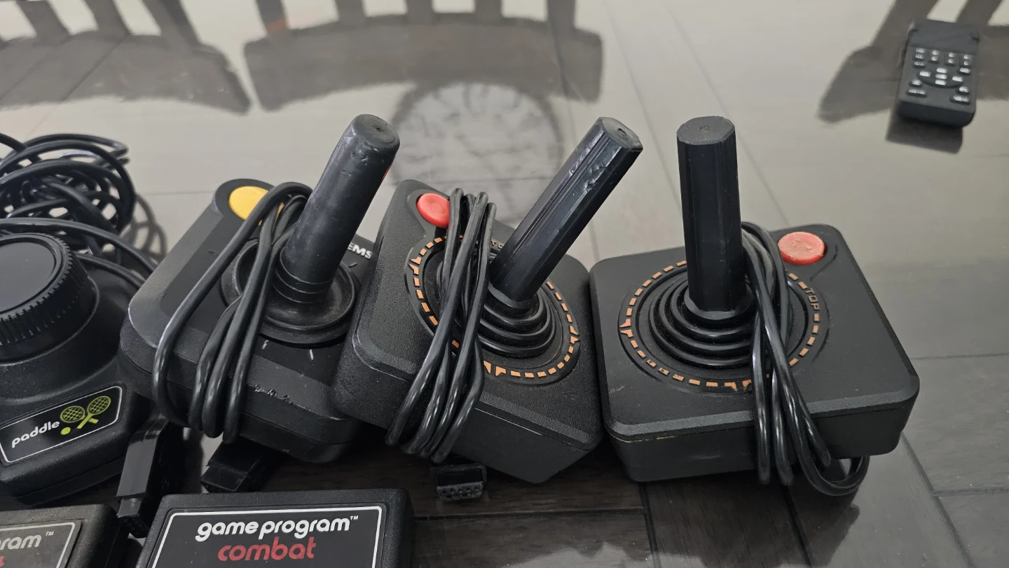 Atari Joysticks, Paddle Controllers & Combat Game Cartridges - photo 2