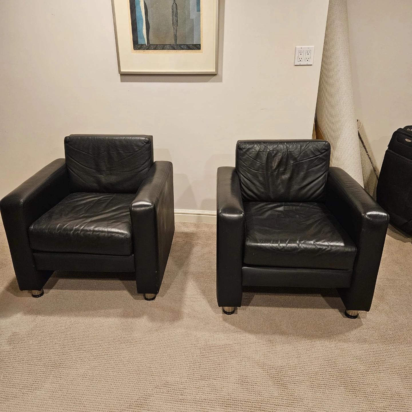 Black armchairs