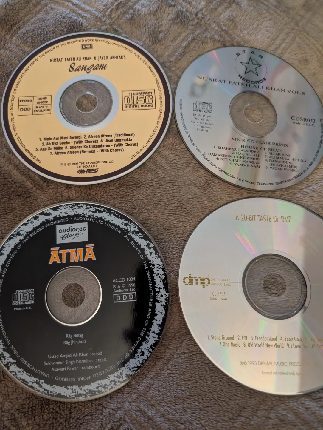 4 CDs: Nusrat Fateh Ali Khan, Atma, DMP, Mick St. Clair
