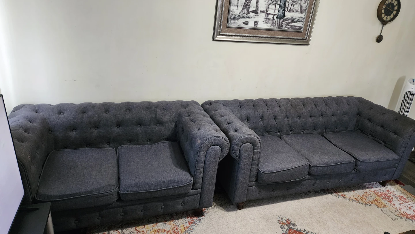 Grey fabric sofa .