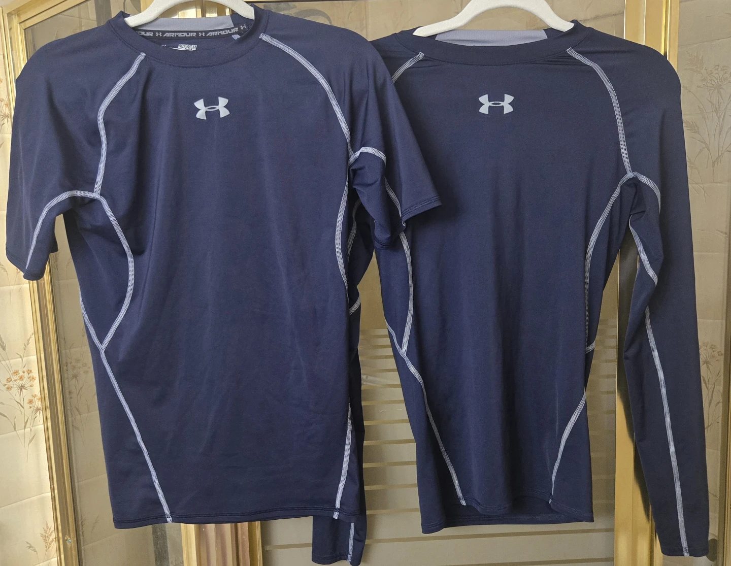2 Under Armour Men’s Medium Blue HeatGear Compression Shirts.