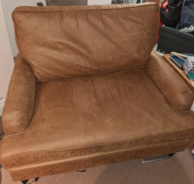 Brown Faux Leather loveseat