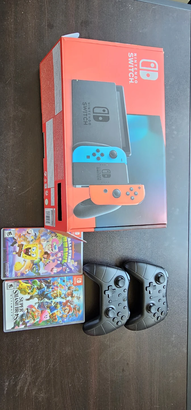 Nintendo Switch Console with Games and Controllers