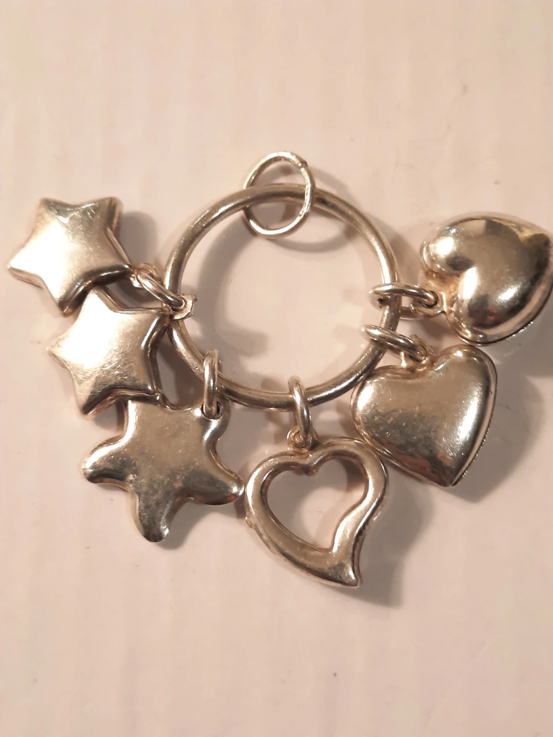 Sterling silver pendant with lots of charms