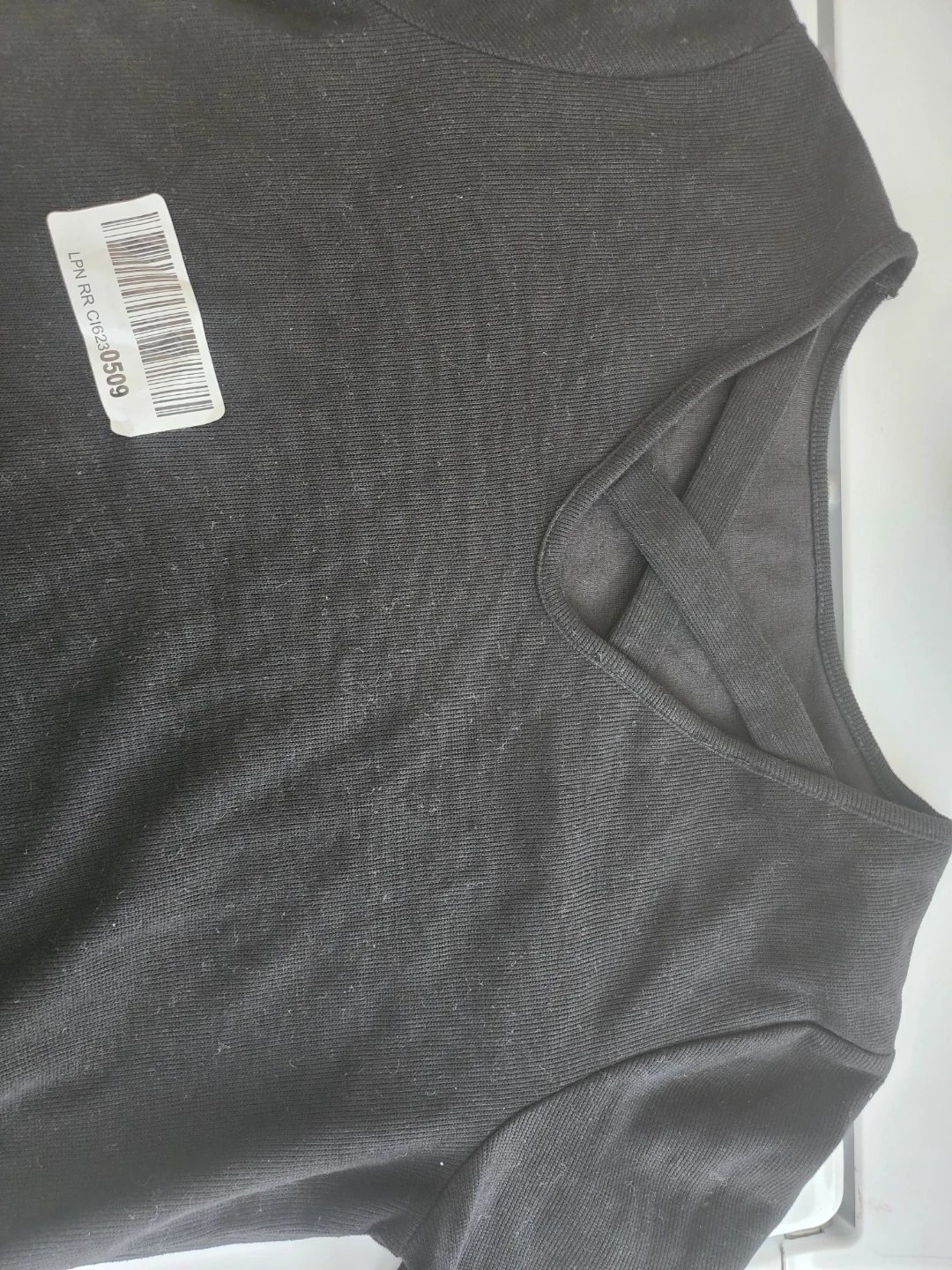 Black long-sleeve top with criss-cross detail ⚽️ - photo 2