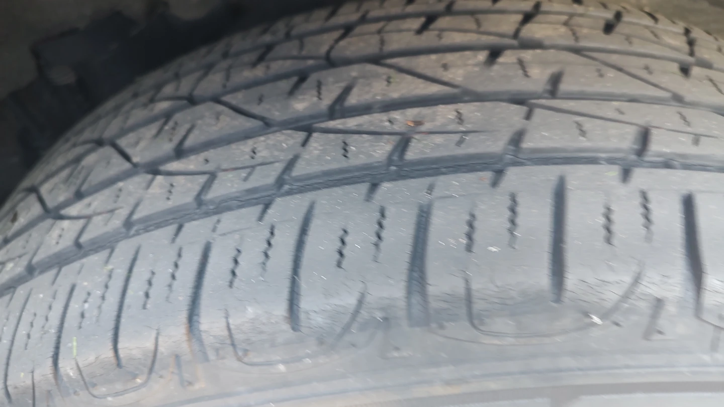 Firestone Destination LE2 Tire and Toyota Rim