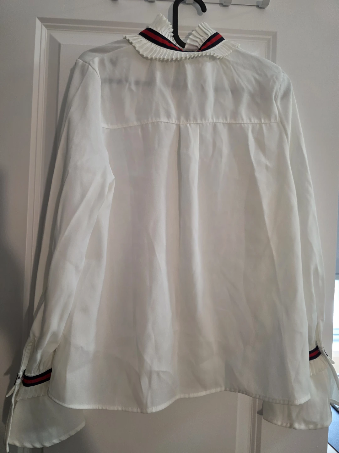 White blouse with red and black ribbon - photo 4