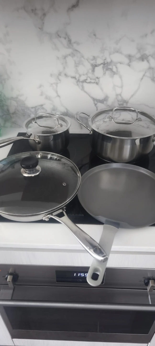 Stainless steel cookware set with lids and frying pan