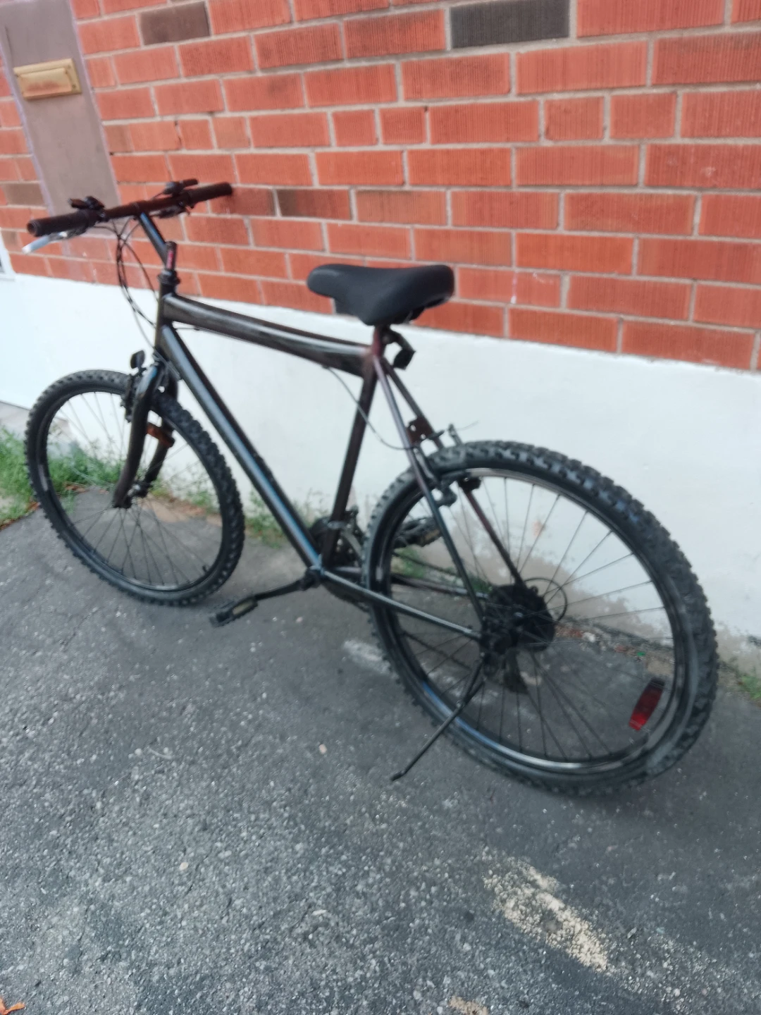 Dark coloured mountain bike - photo 2