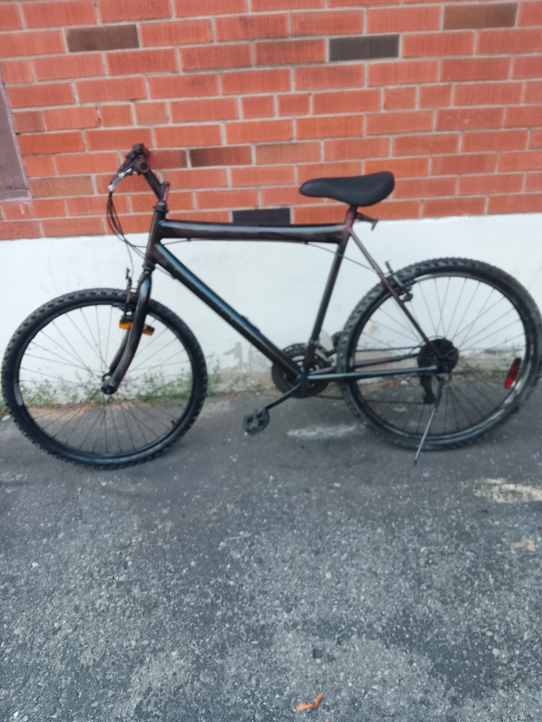 Dark coloured mountain bike - photo 3