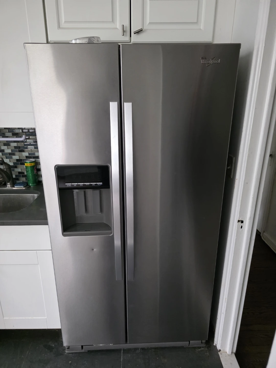 Whirlpool Side-by-Side Refrigerator with Water Dispenser