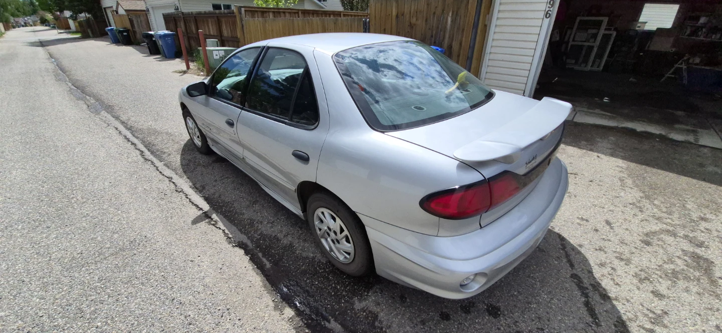 Silver Pontiac Sunfire Sedan - photo 3