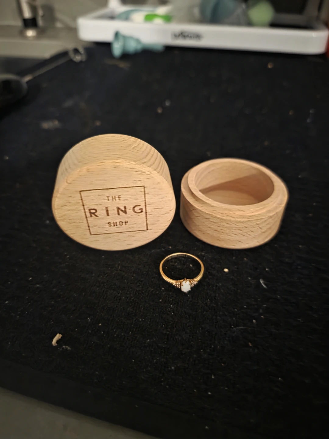 Gold ring with an opal stones