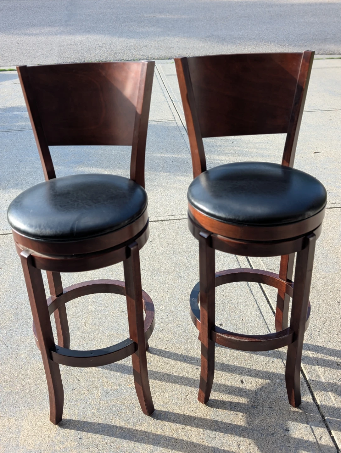 Set of 2 Swivel Bar Stools - Wood and Black Leather