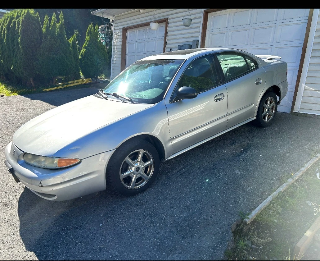 Silver Oldsmobile Alero Sedan - photo 3